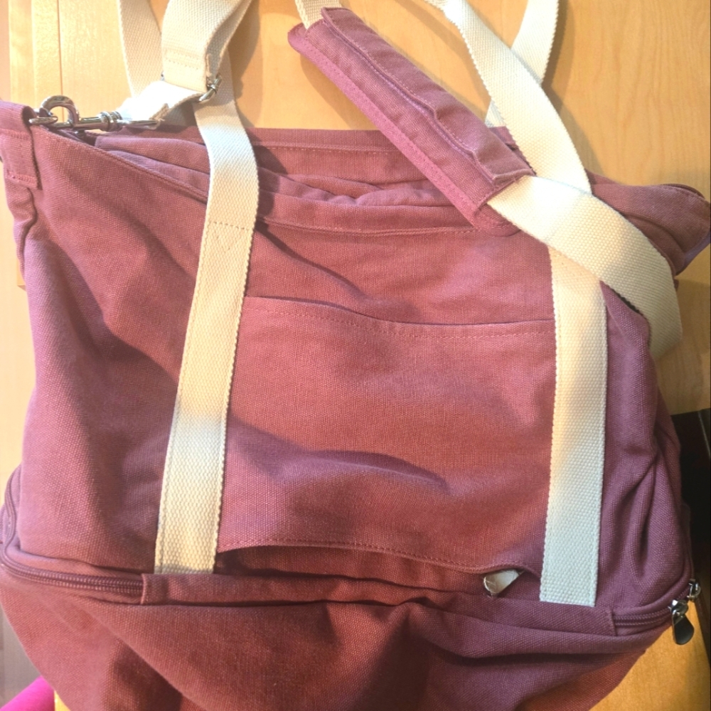 Lo & Sons Catalina Deluxe Tote canvas carry on bag in dusty rose.